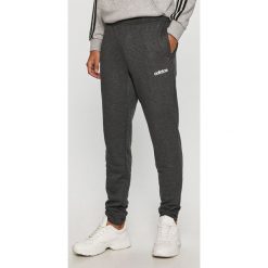 Adidas - Spodnie. Szare spodnie męskie Adidas, na co dzień, s, z nadrukiem, z poliesteru. Za 179,90 zł.
