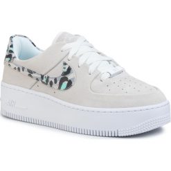 Buty NIKE - Af1 Sage Low CQ7511 071 Black/Team Gold/White/Black. Brązowe buty sportowe damskie Nike, bez wzorów, ze skóry, sportowe. Za 469,00 zł.