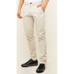 Spodnie materiałowe Tommy Jeans Tjm Scanton Chino Pant DM0DM06518. Brązowe jeansy męskie Tommy Jeans, m, bez wzorów. W wyprzedaży za 369,00 zł.