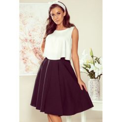 Rozkloszowana Spódnica Midi Z Kieszonkami Czarna. Czarne spódniczki damskie numoco, s, z elastanu, midi, rozkloszowane. Za 149,00 zł.