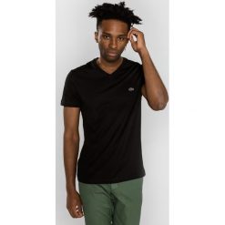 Lacoste Koszulka Czarny. Czarne podkoszulki męskie Lacoste, s, bez wzorów, z bawełny, z krótkim rękawem. Za 180,95 zł.