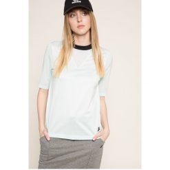 Nike Sportswear - Top. Niebieskie topy damskie marki Nike Sportswear, s, z elastanu, z okrągłym kołnierzem. W wyprzedaży za 119,90 zł.