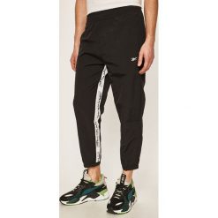 Reebok - Spodnie. Czarne spodnie męskie Reebok, s, z bawełny, sportowe. Za 199,90 zł.