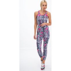 Legginsy sportowe damskie: Kolorowe legginsy sportowe w geometryczne kształty / mięta H0010