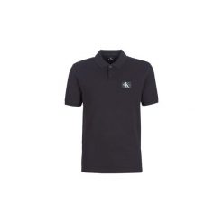 Koszulki polo z krótkim rękawem Calvin Klein Jeans MONOGRAM LOGO REGULAR FIT POLO. Czarne koszulki męskie marki Calvin Klein Jeans, s, bez wzorów, z jeansu, polo, z krótkim rękawem, krótkie. Za 309,00 zł.