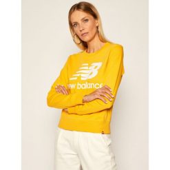 Bluza New Balance Essentials Crew NBWT03551. Żółte bluzy damskie New Balance, xs, bez wzorów, bez rękawów, bez kaptura. Za 229,00 zł.