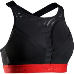 Stanik 500 2 w 1: trzymanie i ochrona. Pomarańczowe biustonosze sportowe damskie OUTSHOCK, s, bez wzorów, z elastanu. Za 129,99 zł.