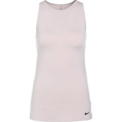 Nike Performance DRY TANK OVAL BACK Koszulka sportowa particle rose/particle rose/black. Czerwone topy sportowe damskie Nike Performance, xl, z elastanu. W wyprzedaży za 125,10 zł.
