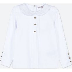 Coccodrillo - Longsleeve dziecięcy 92-122 cm. Białe bluzki dziewczęce COCCODRILLO, bez wzorów, z dzianiny, z okrągłym kołnierzem, z długim rękawem, długie, bez kaptura. Za 49,90 zł.