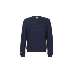 Bluzy Lacoste SH8546. Niebieskie bluzy męskie Lacoste, s, bez wzorów, bez kołnierzyka, bez rękawów, bez kaptura. Za 492,20 zł.