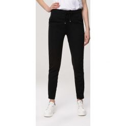 Czarne Spodnie Prove. Czarne spodnie damskie Born2be, xl, z dresówki. W wyprzedaży za 34,99 zł.