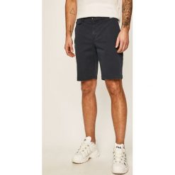 Calvin Klein - Szorty. Brązowe spodenki i szorty męskie Calvin Klein, bez wzorów, z elastanu, casualowe. W wyprzedaży za 219,90 zł.