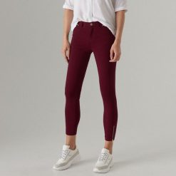 Spodnie super skinny z zamkami - Bordowy. Czerwone spodnie damskie Mohito. Za 119,99 zł.