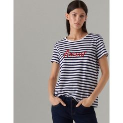 Bawełniana koszulka oversize - Biały. Białe koszulki damskie Mohito, s, bez wzorów, z bawełny, bez kołnierzyka, bez rękawów. Za 49,99 zł.
