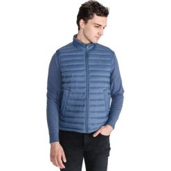 Tommy Hilfiger Kamizelka Niebieski. Niebieskie płaszcze męskie TOMMY HILFIGER, na wiosnę, m, bez wzorów, z materiału, bez kaptura. Za 791,95 zł.