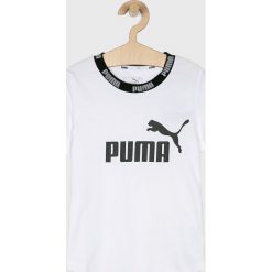 Puma - Top dziecięcy 128-176 cm. Białe bluzki dziewczęce Puma, z nadrukiem, z bawełny, z okrągłym kołnierzem, z krótkim rękawem, krótkie, bez kaptura. Za 69,90 zł.