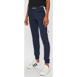 Calvin Klein Underwear - Spodnie. Niebieskie spodnie damskie Calvin Klein Underwear, s, bez wzorów, z elastanu, casualowe. Za 269,90 zł.