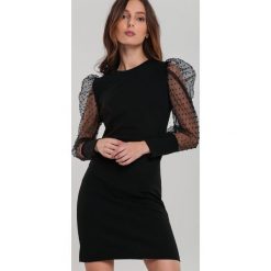 Czarna Sukienka Rushton. Czarne sukienki damskie Renee, s, z aplikacjami, klasyczne, z okrągłym kołnierzem, długie, mini, dopasowane. Za 99,99 zł.