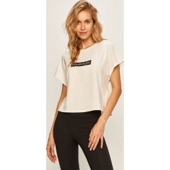 Calvin Klein Performance - T-shirt. Białe bluzki damskie Calvin Klein Performance, s, z nadrukiem, z elastanu, casualowe, z okrągłym kołnierzem, z krótkim rękawem. Za 179,90 zł.