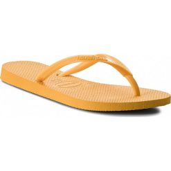 Japonki HAVAIANAS - Slim 40000301652 Banana Yellow. Żółte klapki damskie Havaianas, bez wzorów, z tworzywa sztucznego, bez obcasa. W wyprzedaży za 99,00 zł.