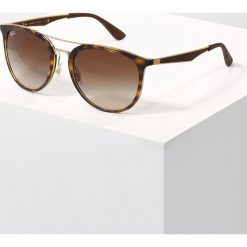 RayBan Okulary przeciwsłoneczne havana/brown gradient. Pomarańczowe okulary przeciwsłoneczne damskie Ray-Ban. Za 739,00 zł.