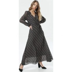 Czarna Sukienka Pheronei. Czarne sukienki damskie Born2be, s, bez wzorów, bez kołnierzyka, bez rękawów, maxi. Za 149,99 zł.