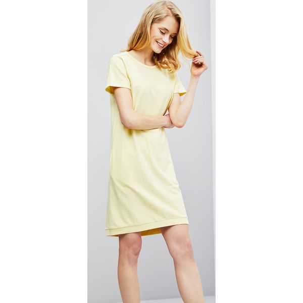 Sukienka z wycięciem na plecach. Żółte spodnie damskie Moodo, xs. Za 19,99 zł.