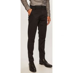 Tommy Jeans - Spodnie. Szare spodnie męskie Tommy Jeans, na co dzień, bez wzorów, z elastanu, casualowe. W wyprzedaży za 269,90 zł.