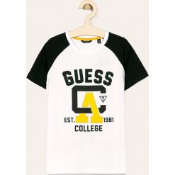 Guess Jeans - T-shirt dziecięcy 118-175 cm. Białe t-shirty chłopięce z aplikacjami, z bawełny. Za 99,90 zł.