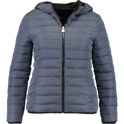 Champion REVERSIBLE JACKET Kurtka przejściowa nbk/chc. Czarne kurtki sportowe damskie marki Champion, z materiału. Za 419,00 zł.