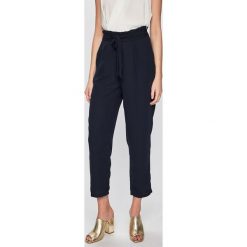 Vero Moda - Spodnie. Niebieskie legginsy damskie Vero Moda, s, bez wzorów, z poliesteru. W wyprzedaży za 79,90 zł.