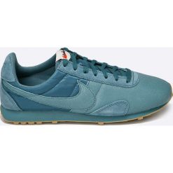 Nike Sportswear - Buty. Niebieskie buty sportowe damskie marki Nike Sportswear, bez wzorów, ze skóry, sportowe. W wyprzedaży za 219,90 zł.