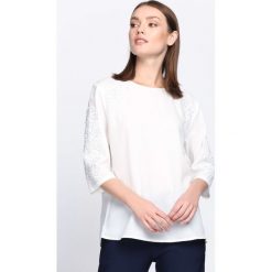 Biała Bluzka Crazy For You. Białe bluzki z odkrytymi ramionami marki Born2be, xl, z koronki, z okrągłym kołnierzem. Za 49,99 zł.