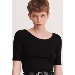 Bluzka z bawełny organicznej - Czarny. Czarne bluzki damskie Reserved, s, bez wzorów, z bawełny, bez kołnierzyka, bez rękawów. Za 29,99 zł.
