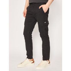 Jeansy Taper Fit Superdry Core Cargo M7010024A. Czarne jeansy męskie Superdry, m, bez wzorów, z elastanu. W wyprzedaży za 269,00 zł.