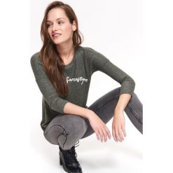 T-shirt damski, z nadrukiem. Zielone t-shirty damskie TROLL, l, z nadrukiem, z dzianiny. W wyprzedaży za 34,99 zł.