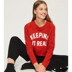Bluza z nadrukiem - Czerwony. Czerwone bluzy rozpinane damskie Sinsay, l, z nadrukiem. Za 39,99 zł.