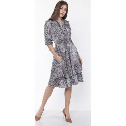 Sukienka z falbanką, SUK168 wąż. Sukienki damskie Lanti, bez wzorów, ze stójką, bez rękawów, midi. Za 189,00 zł.