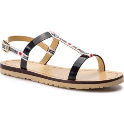 Sandały LOVE MOSCHINO - JA16421G07JV110A Bia/Ver.Ner. Czarne klapki damskie Love Moschino, bez wzorów, ze skóry, bez obcasa. W wyprzedaży za 309,00 zł.