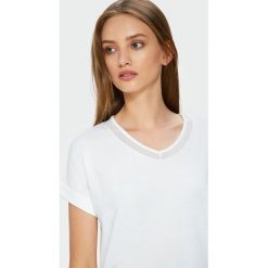 Elegancki top z siateczką. Topy damskie Greenpoint, bez wzorów, z elastanu, bez kołnierzyka. Za 24,99 zł.