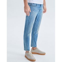 Jeansy Loose Cropped - Niebieski. Niebieskie jeansy męskie Cropp, m, bez wzorów. W wyprzedaży za 49,99 zł.