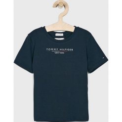 Tommy Hilfiger - Top. Białe bluzki dziewczęce TOMMY HILFIGER, z nadrukiem, z bawełny, z okrągłym kołnierzem, z krótkim rękawem, krótkie, bez kaptura. W wyprzedaży za 79,90 zł.