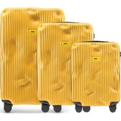 Walizki Stripe w zestawie 3 el. Mustard Yellow. Żółte walizki Crash Baggage, bez wzorów, z tkaniny, wakacyjne. Za 3175,00 zł.
