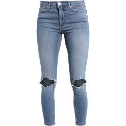 Free People JEAN BUSTED Jeans Skinny Fit light denim. Szare rurki damskie marki Free People. W wyprzedaży za 244,30 zł.