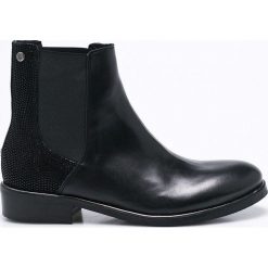 Tommy Hilfiger - Botki Polly. Czarne buty zimowe damskie marki TOMMY HILFIGER, z gumy, z okrągłym noskiem, na obcasie. W wyprzedaży za 499,90 zł.