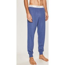 Calvin Klein Underwear - Spodnie piżamowe. Szare piżamy męskie Calvin Klein Underwear, xl, bez wzorów, z elastanu, bez rękawów. Za 269,90 zł.