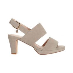 Dasia Sandały Orchid beżowy female beżowy 36. Brązowe sandały damskie Dasia, w paski, ze skóry, eleganckie, bez obcasa, na platformie, z paskami. Za 399,00 zł.
