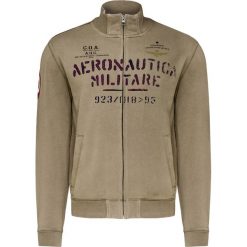 Bluza AERONAUTICA MILITARE. Brązowe bluzy męskie Aeronautica Militare, z nadrukiem, z bawełny, ze stójką, bez rękawów, bez kaptura. W wyprzedaży za 420,00 zł.