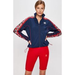 Adidas Originals - Bluza. Niebieskie bluzy damskie adidas Originals, z aplikacjami, z poliesteru, bez rękawów, bez kaptura. W wyprzedaży za 249,90 zł.