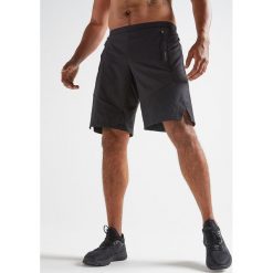 Spodenki fitness cardio 500 męskie. Czarne spodenki sportowe męskie DOMYOS, m, bez wzorów, z elastanu, na fitness i siłownię. Za 59,99 zł.